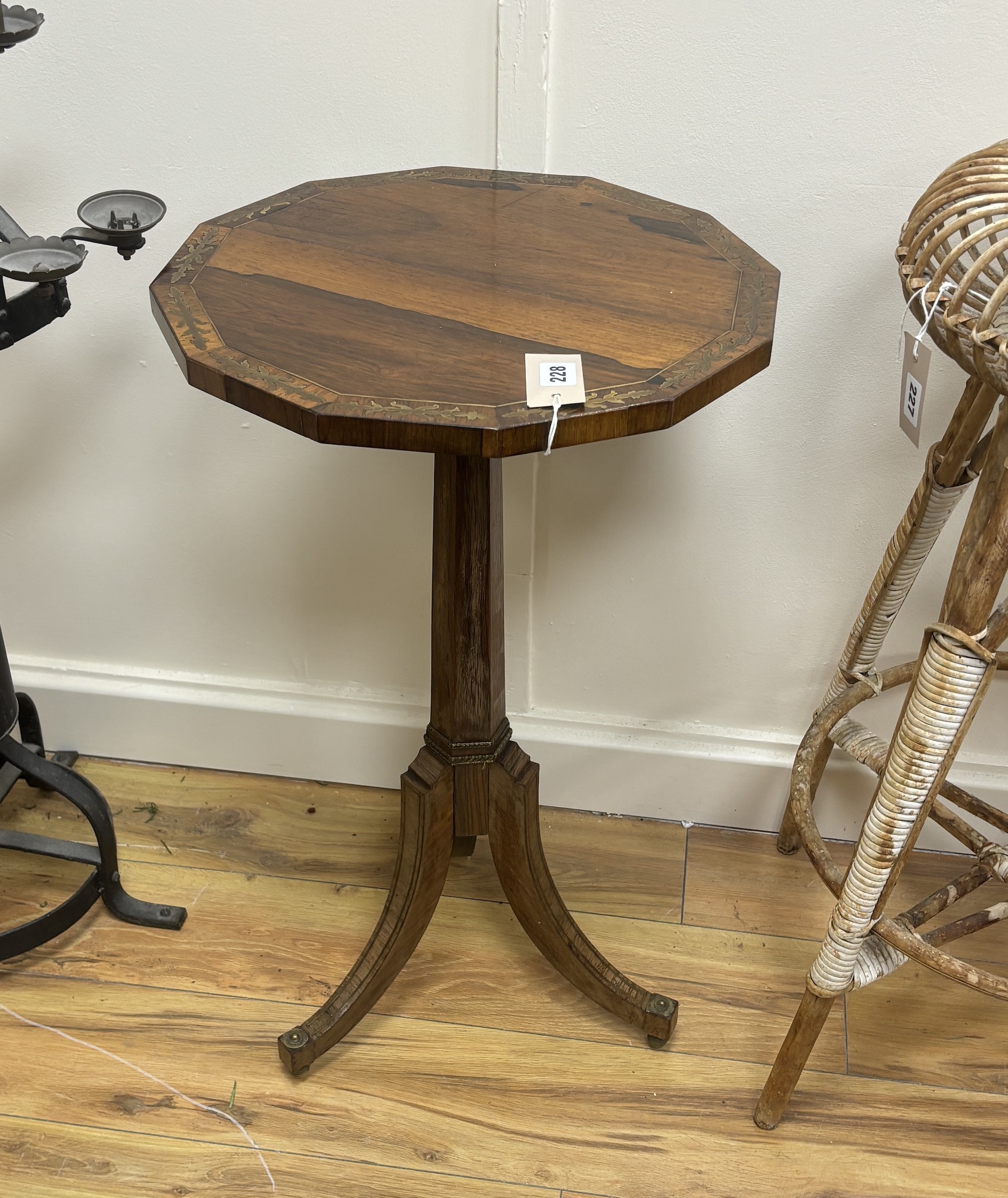 A Regency style cut brass inlaid rosewood tripod wine table, width 42cm, height 70cm